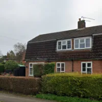 A group of keys hanging on a hook